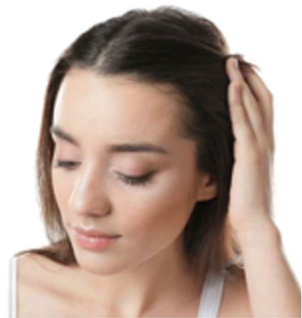 Woman touching back of head to feel hair